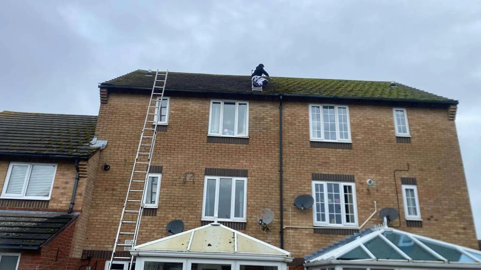 Roofer on the ridge.